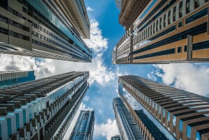 Skyscrapers seen from street level looking straight up